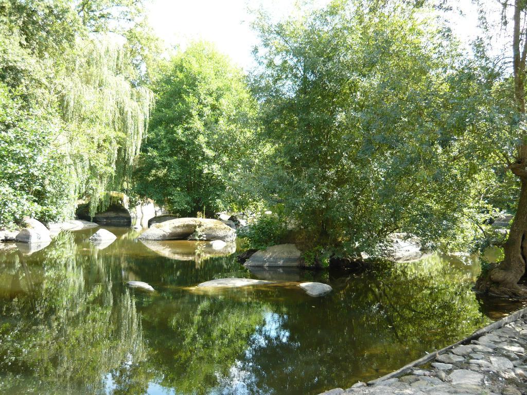 Village de Gîtes du Moulin Neuf Getigne Exterior foto